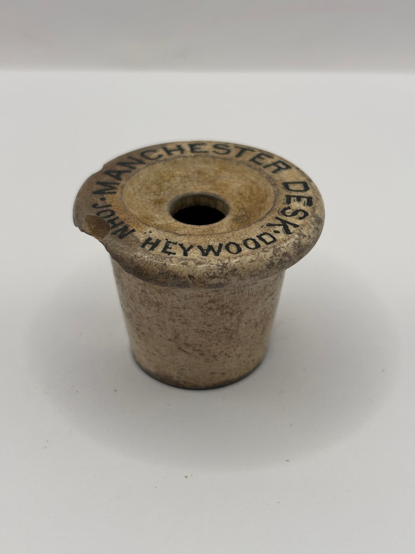 Old advertising stoneware desk inkwell, Manchester. Damaged