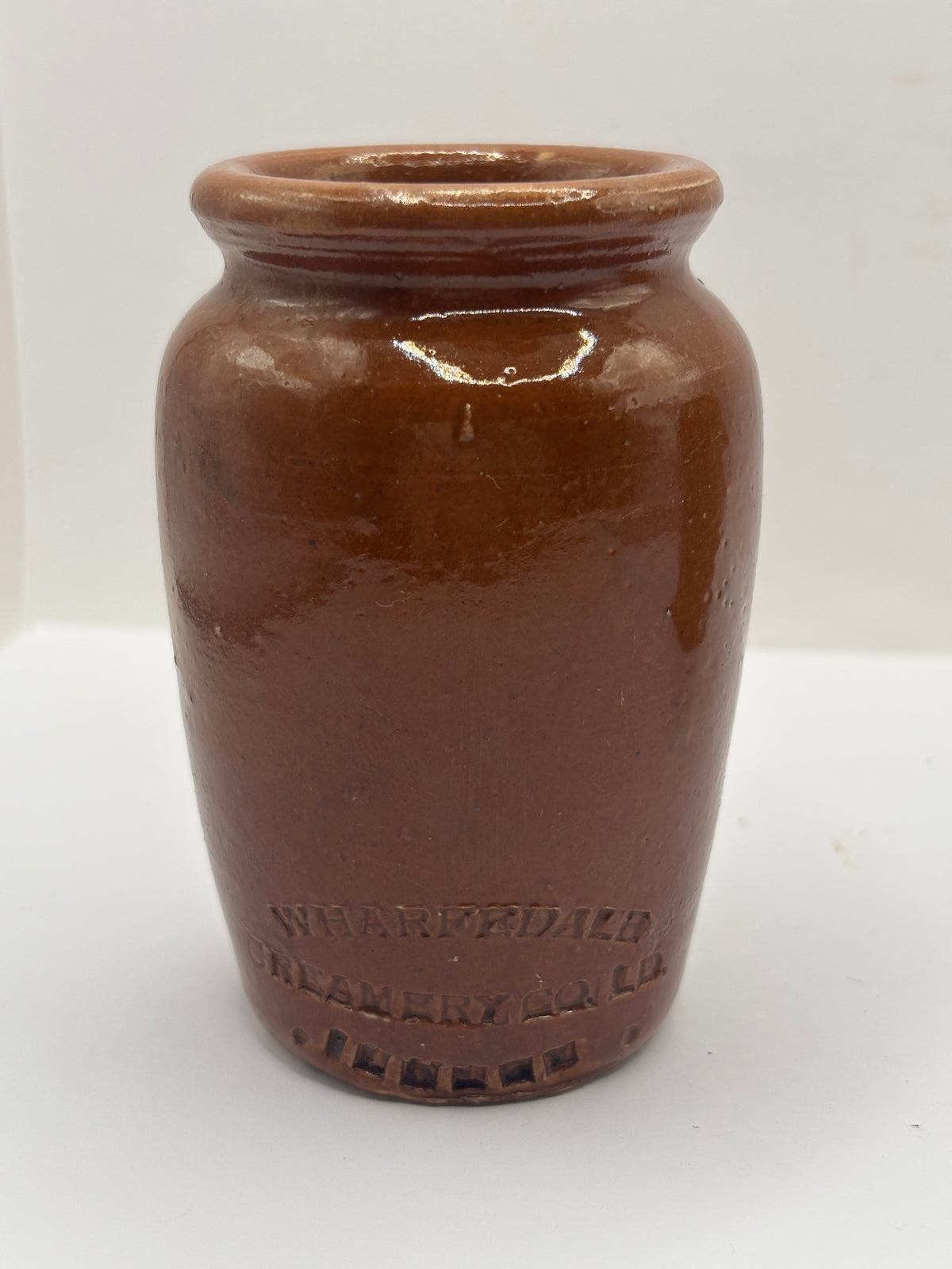 Old advertising cream pot, Wharfdale creamery, Ilkley