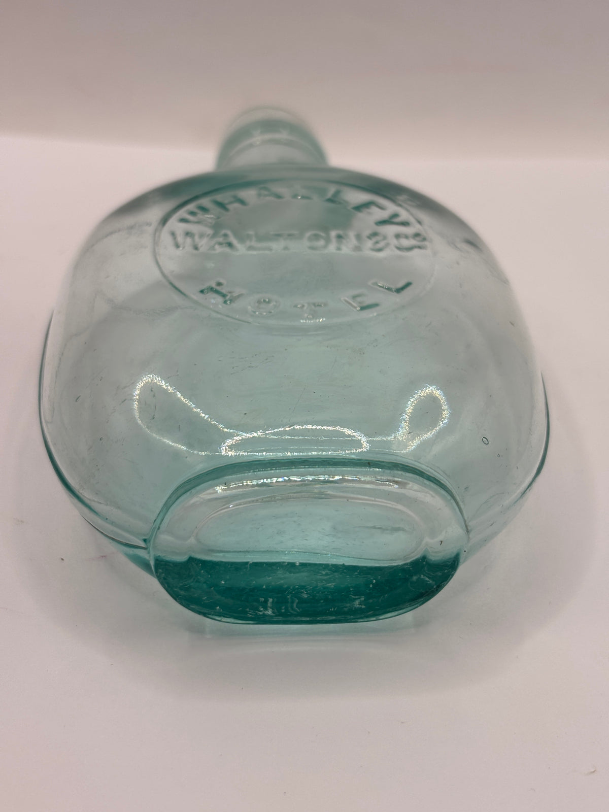 Old glass spirit flask, Whalley hotel