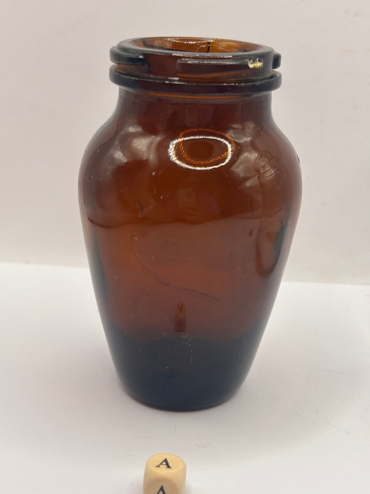 Old amber glass Virol jar (a) 10.5cms