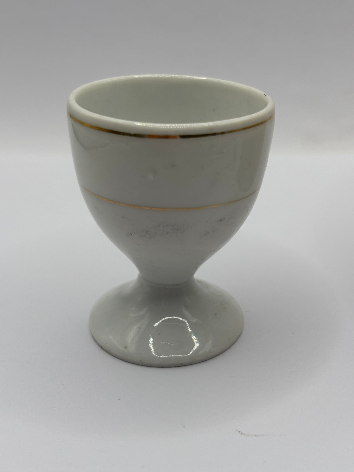 Old ceramic egg cup, dump dug