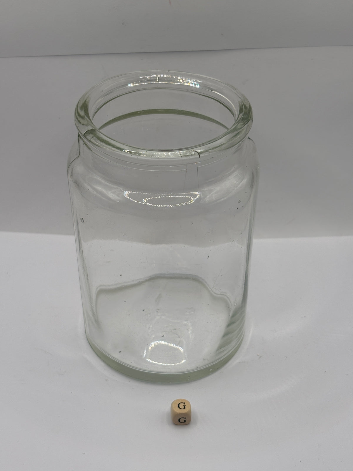 Old clear glass pickle jar (G)