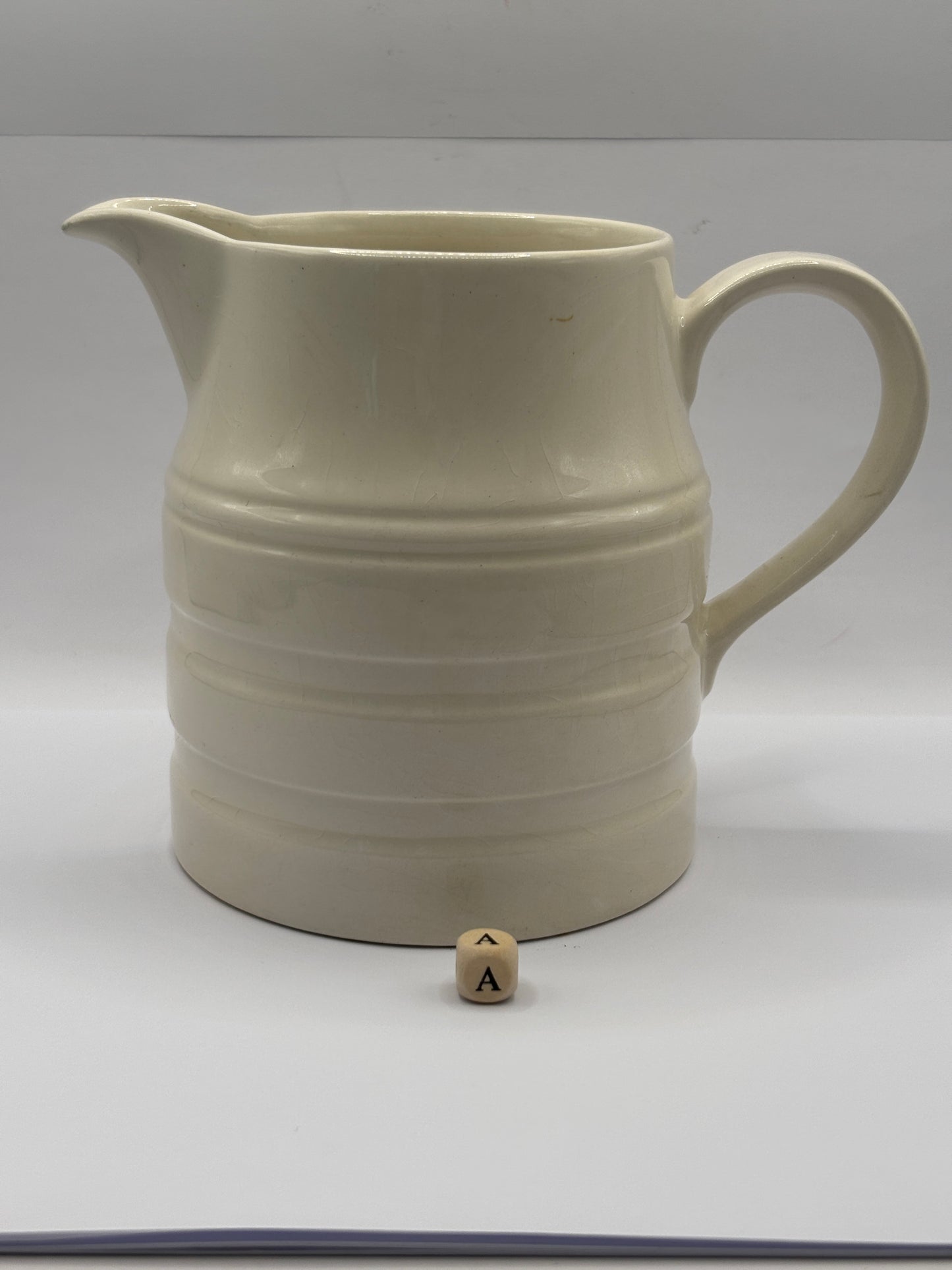 White vintage stoneware jug (a)