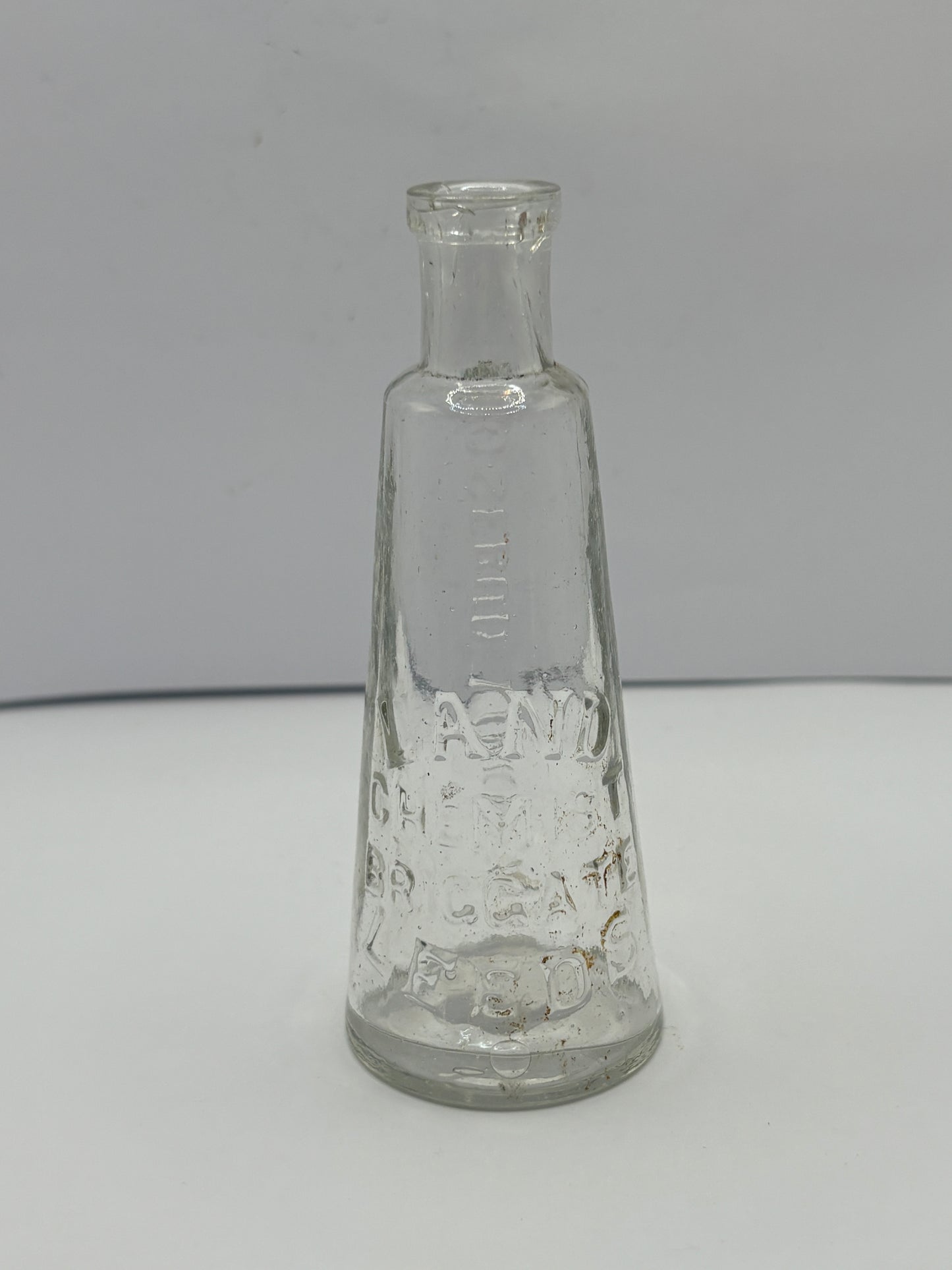 Old Leeds Rosebud liniment advertising bottle, Land chemist Briggate Leeds