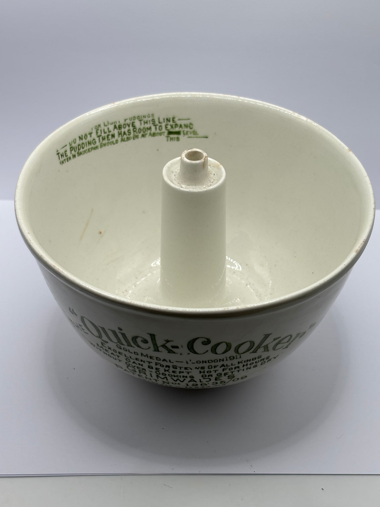 Old stoneware advertising quick cooker