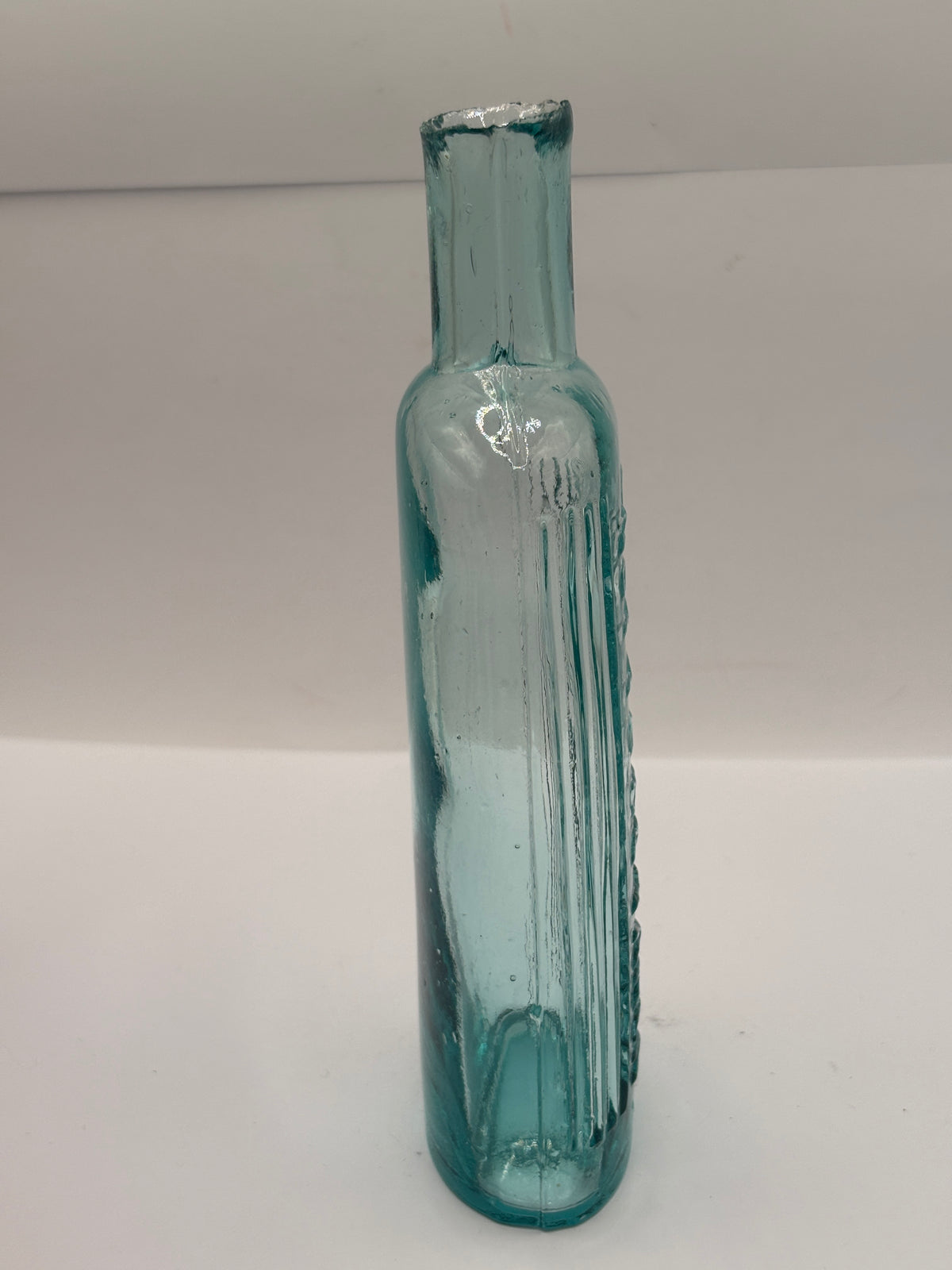 Old aqua glass poison bottle, POISONOUS Not to be taken