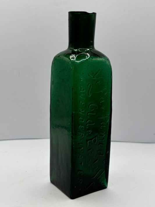 Old green advertising lavender water bottle, Ye far famed olde english lavender water