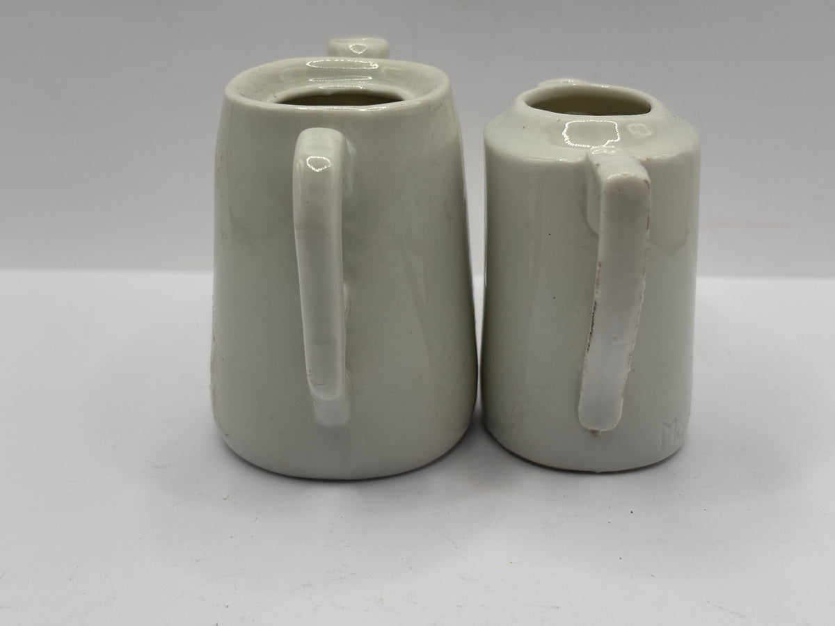 2 old small dolls house tea pots (no lids)