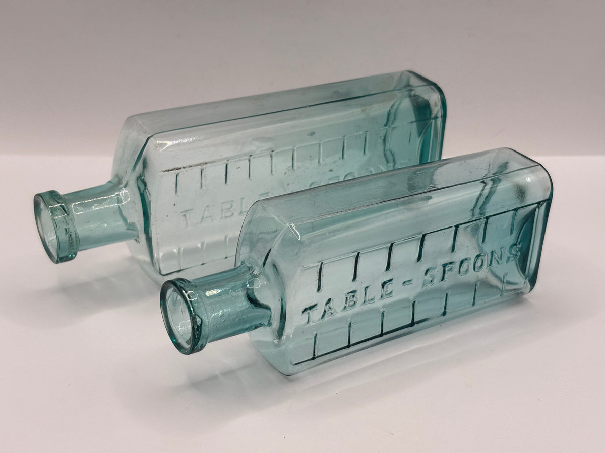 2 old aqua glass medicine bottles, table spoons