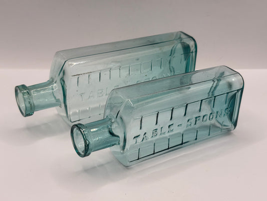 2 old aqua glass medicine bottles, table spoons