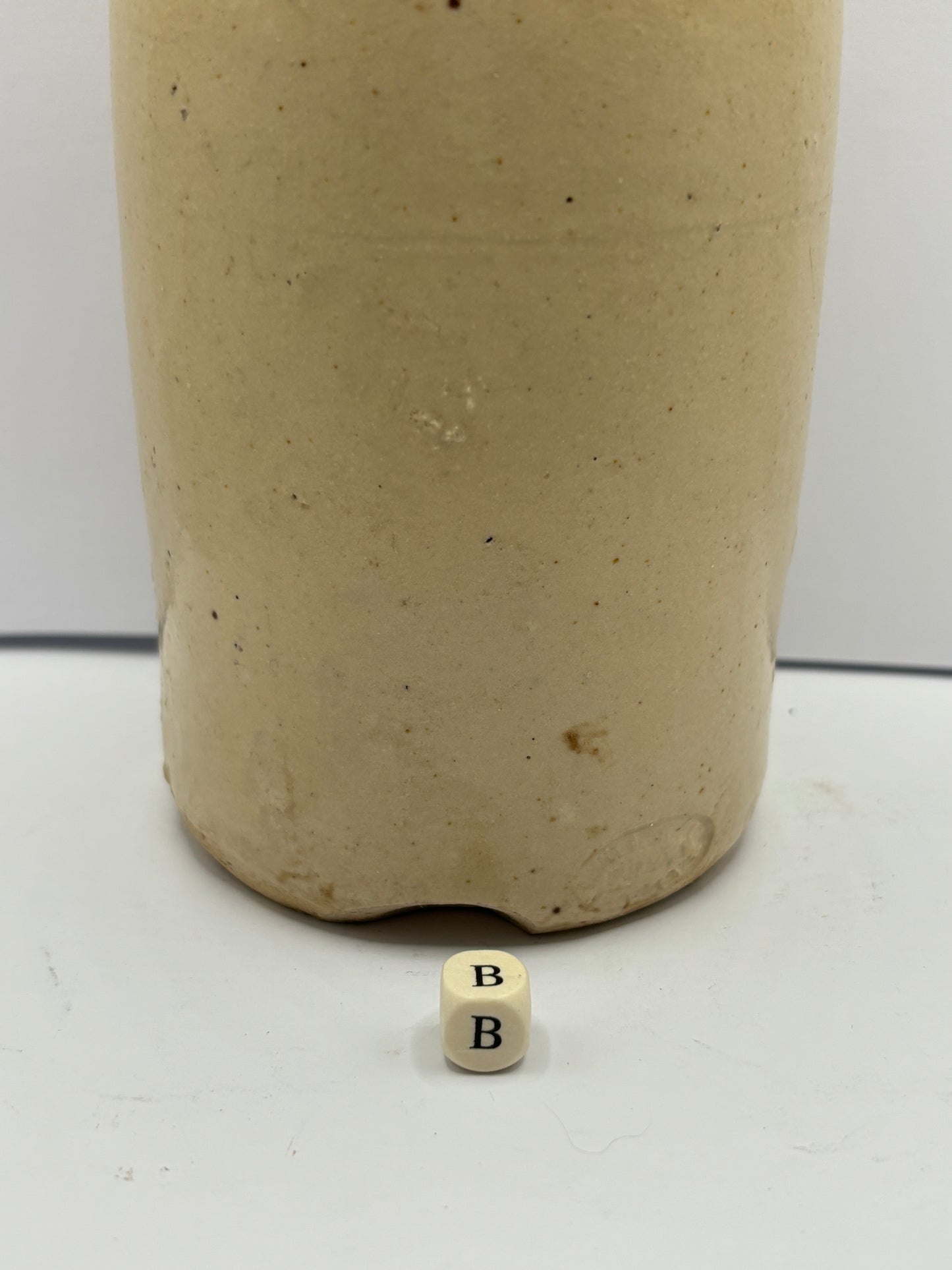 Large plain stoneware ginger beer bottle (B)