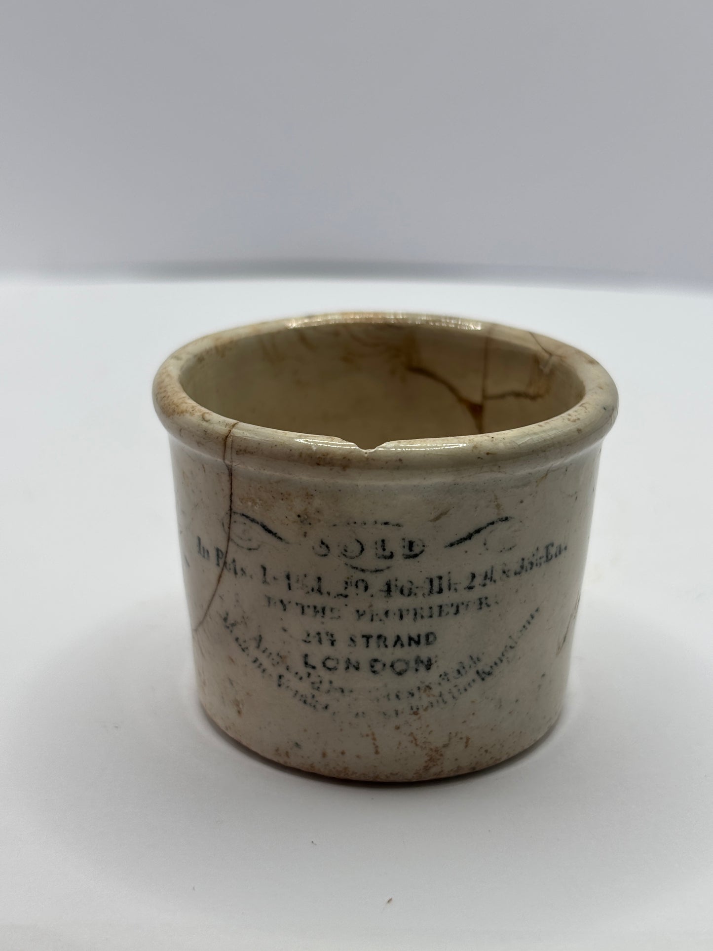 Old early Holloways advertising ointment pot