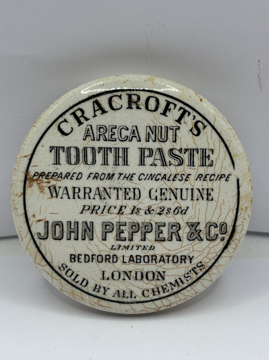 Old cracrofts advertising lid, double sided. Areca nut toothpaste