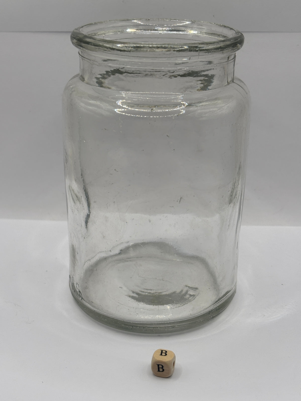 Old clear glass pickle jar (B)