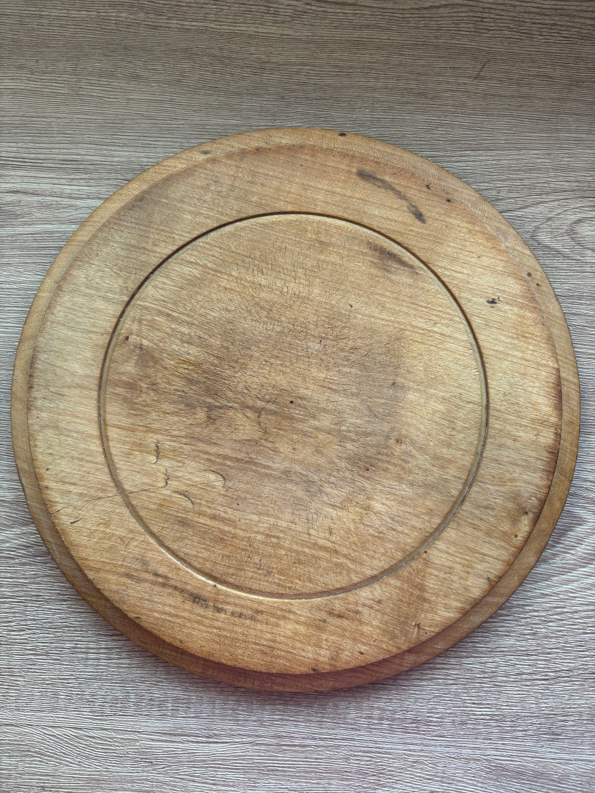 Old wooden carved bread board