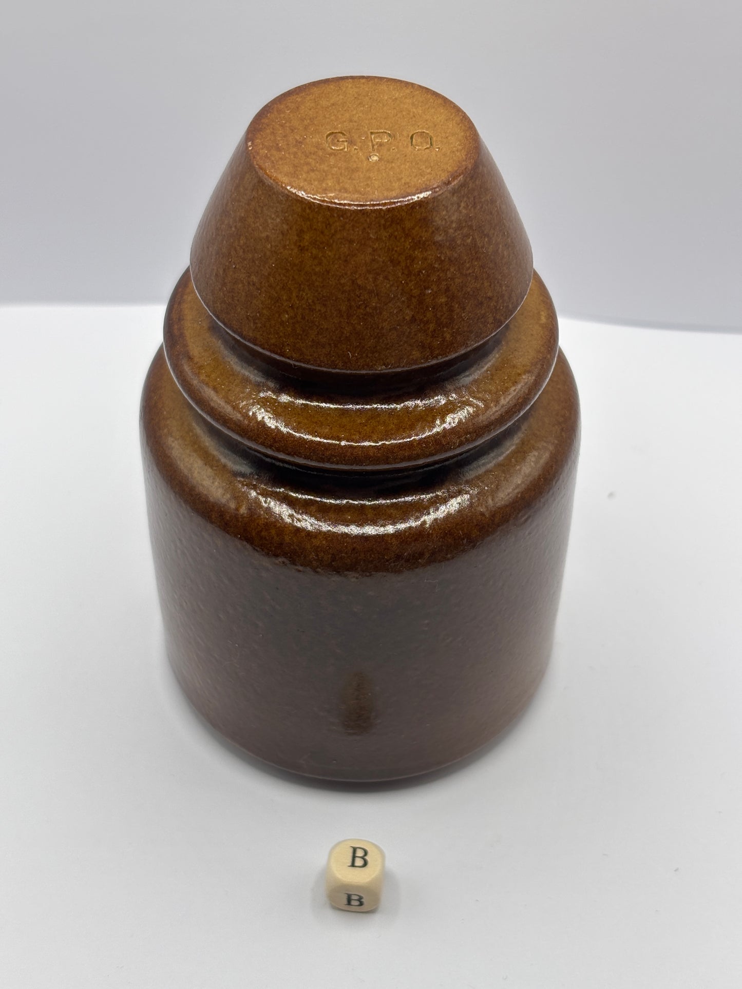 Old stoneware telegraph pole insulator (B)