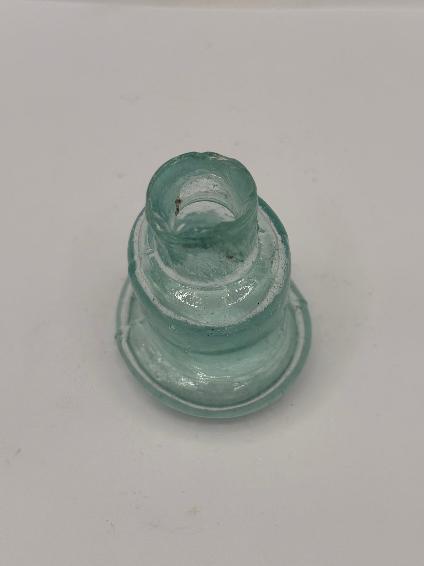 Old aqua glass inkwell, Bell ink. Ink bottle