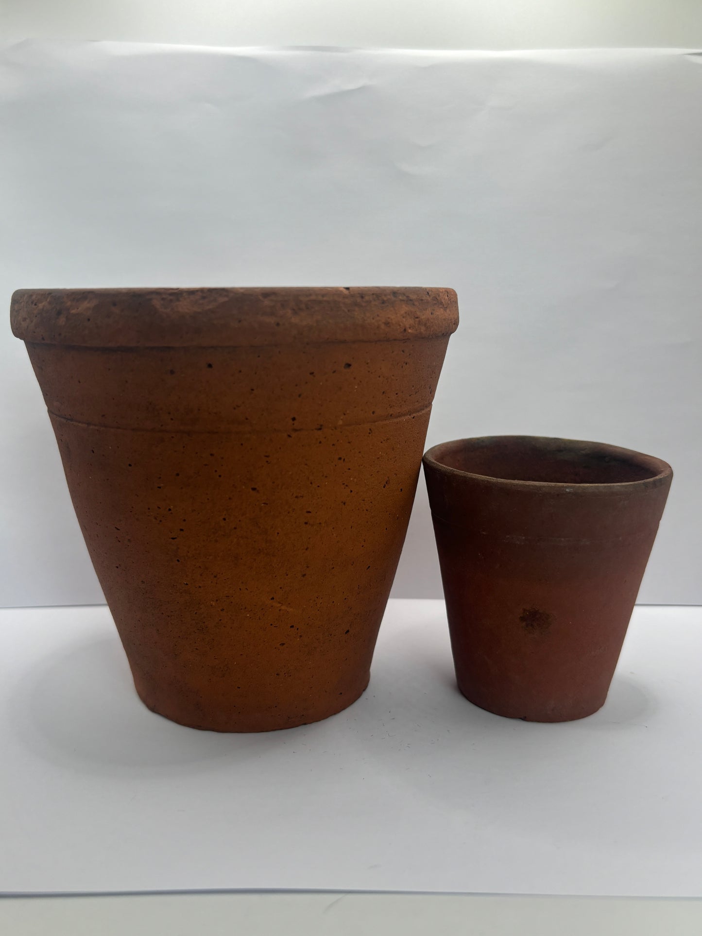 2 old terracotta plant pots