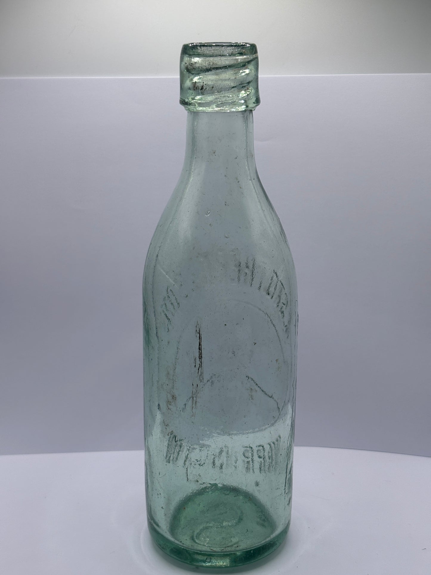 Old aqua glass Stotherts beer bottle