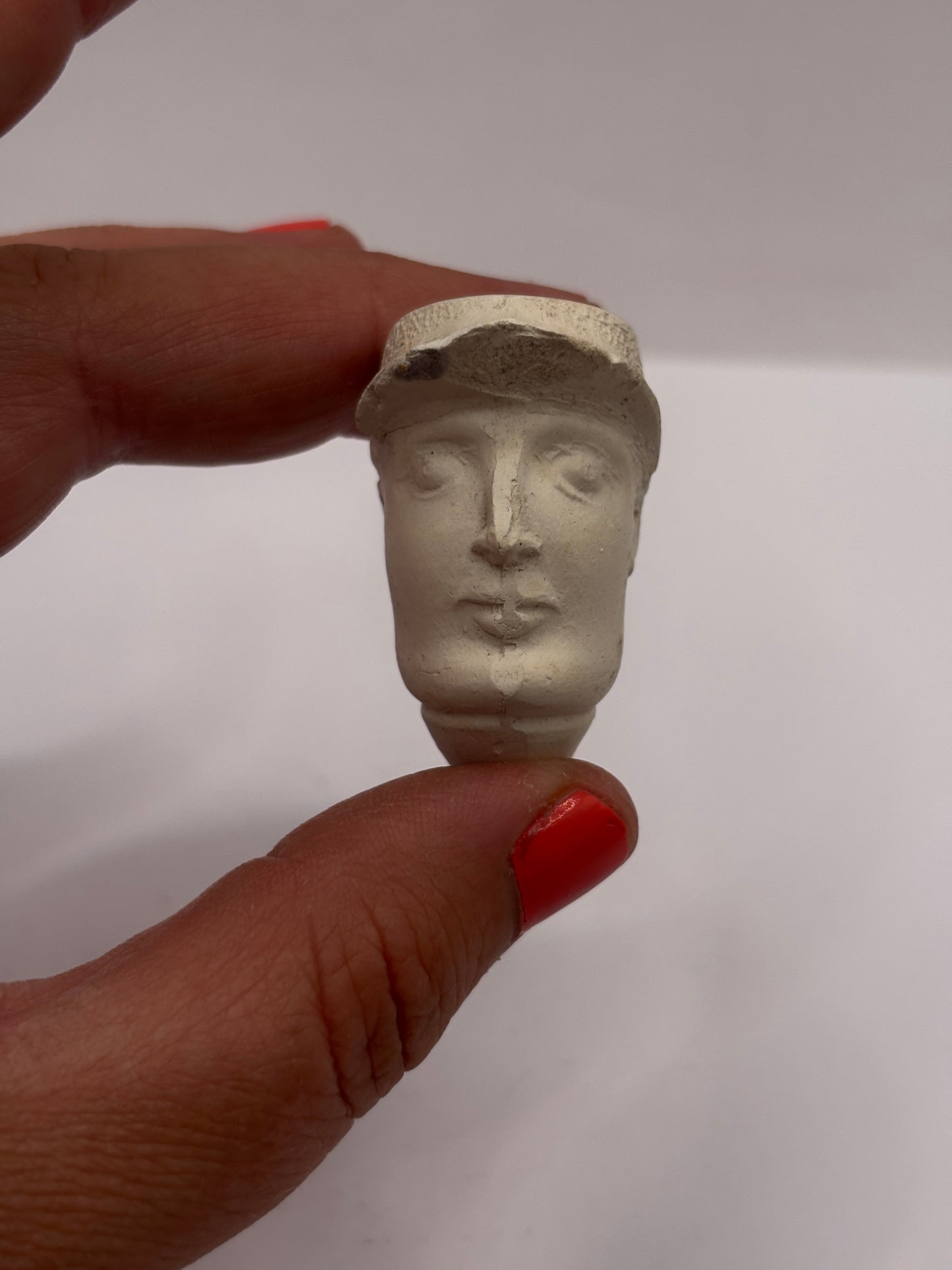 Old figural clay pipe head, pipe bowl