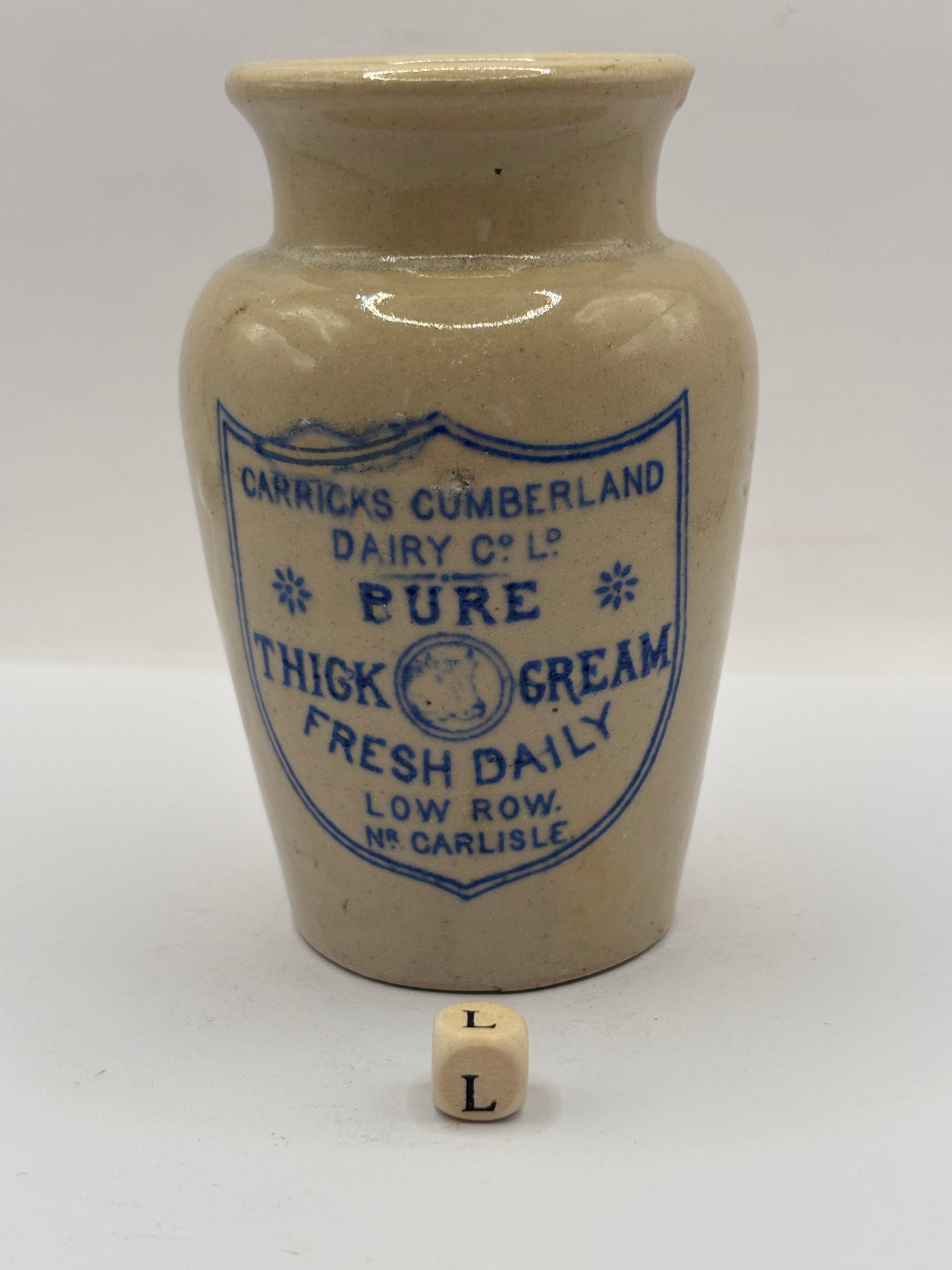 Old advertising cream pot, Carricks Cumberland dairy. Pure thick cream. Small chip (L)