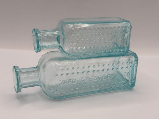 2 aqua glass bottles, Vapo-cresolene co