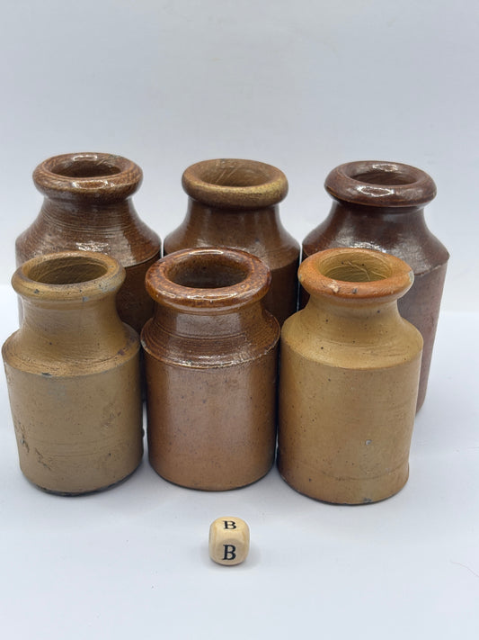 6 small brown stoneware pots (B)
