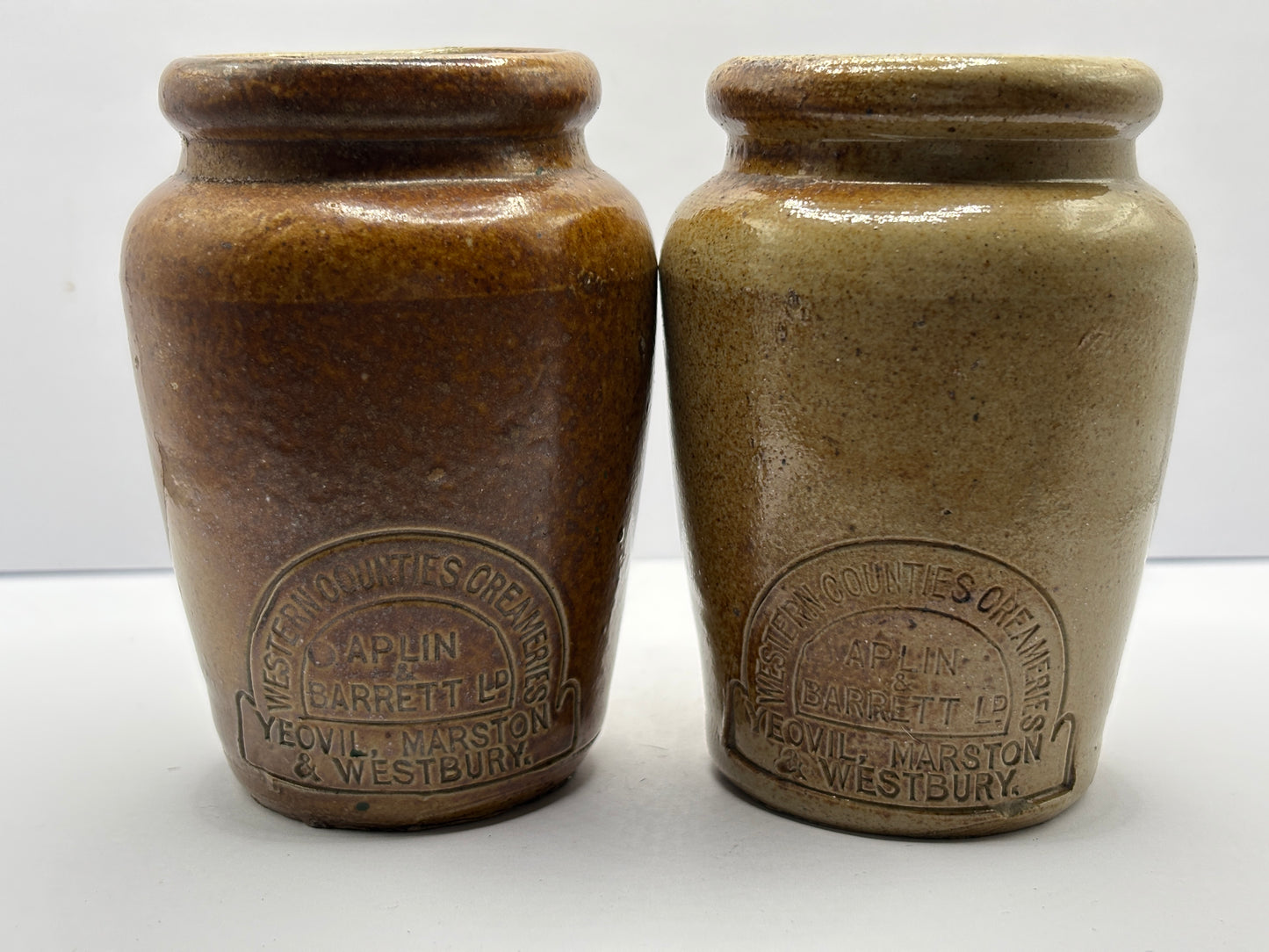 2 old brown stoneware cream pots, west counties creameries
