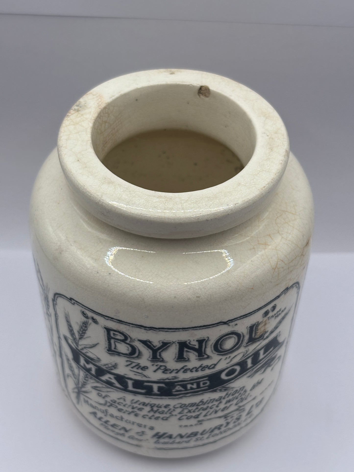 Old stoneware advertising jar, Bynol the perfected malt & oil