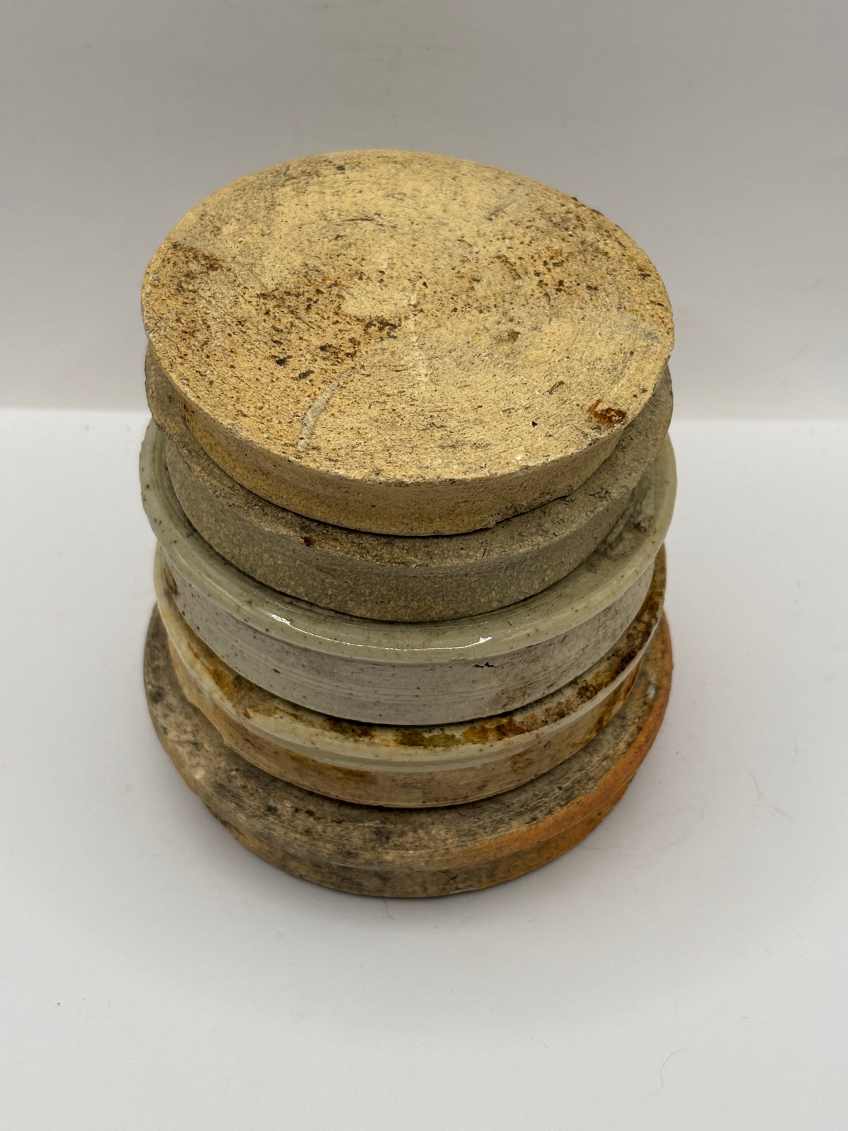 5 old stoneware ginger jar lids, stackers
