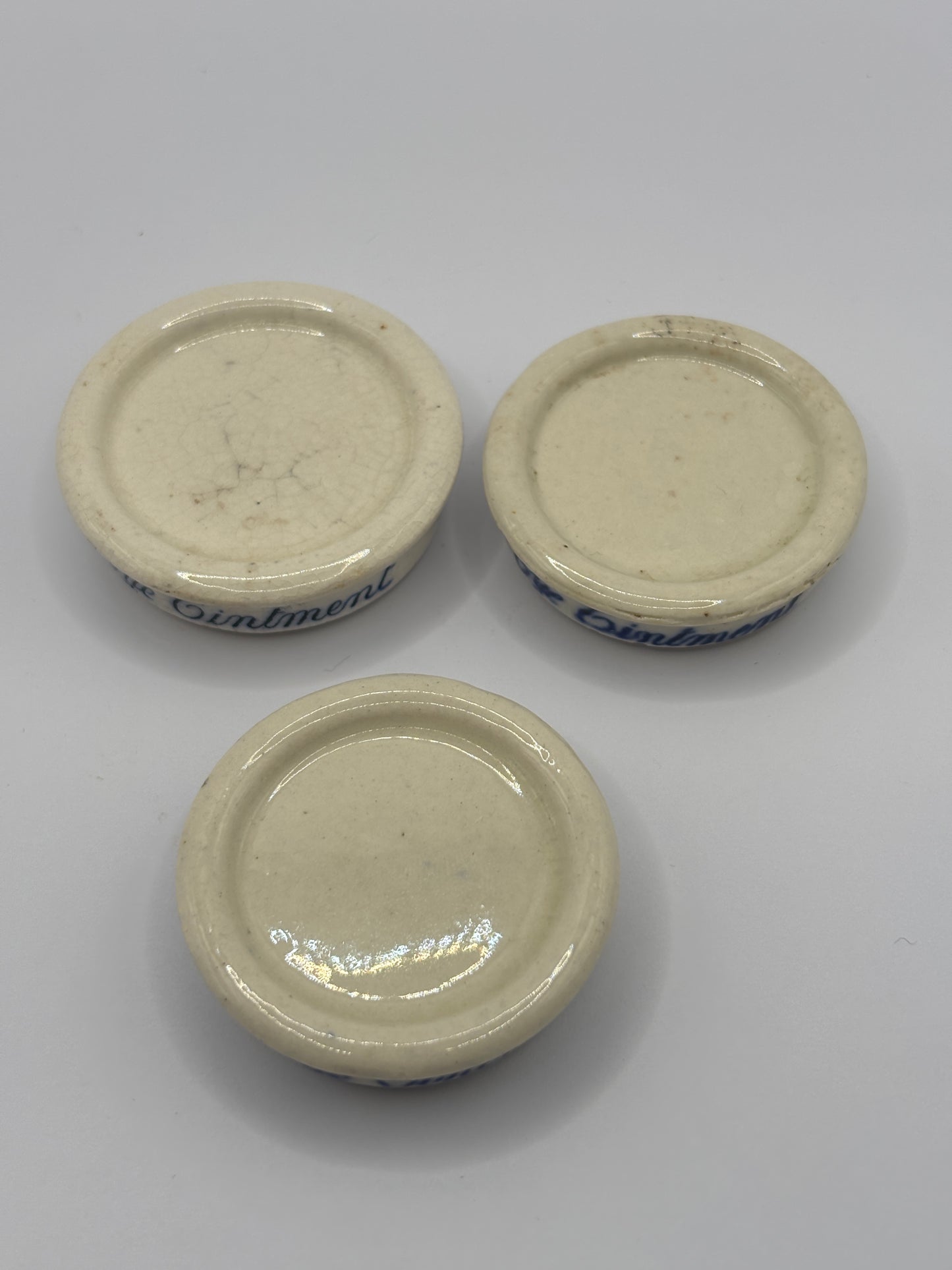 3 Old Singletons stoneware eye ointment, stack