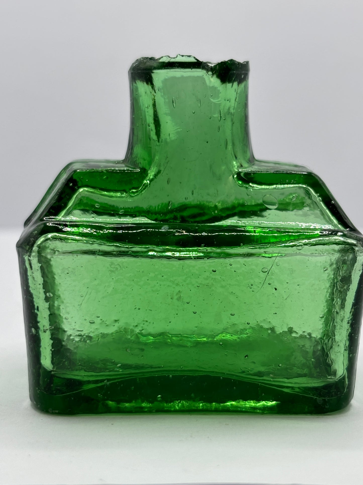 Old green inkwell