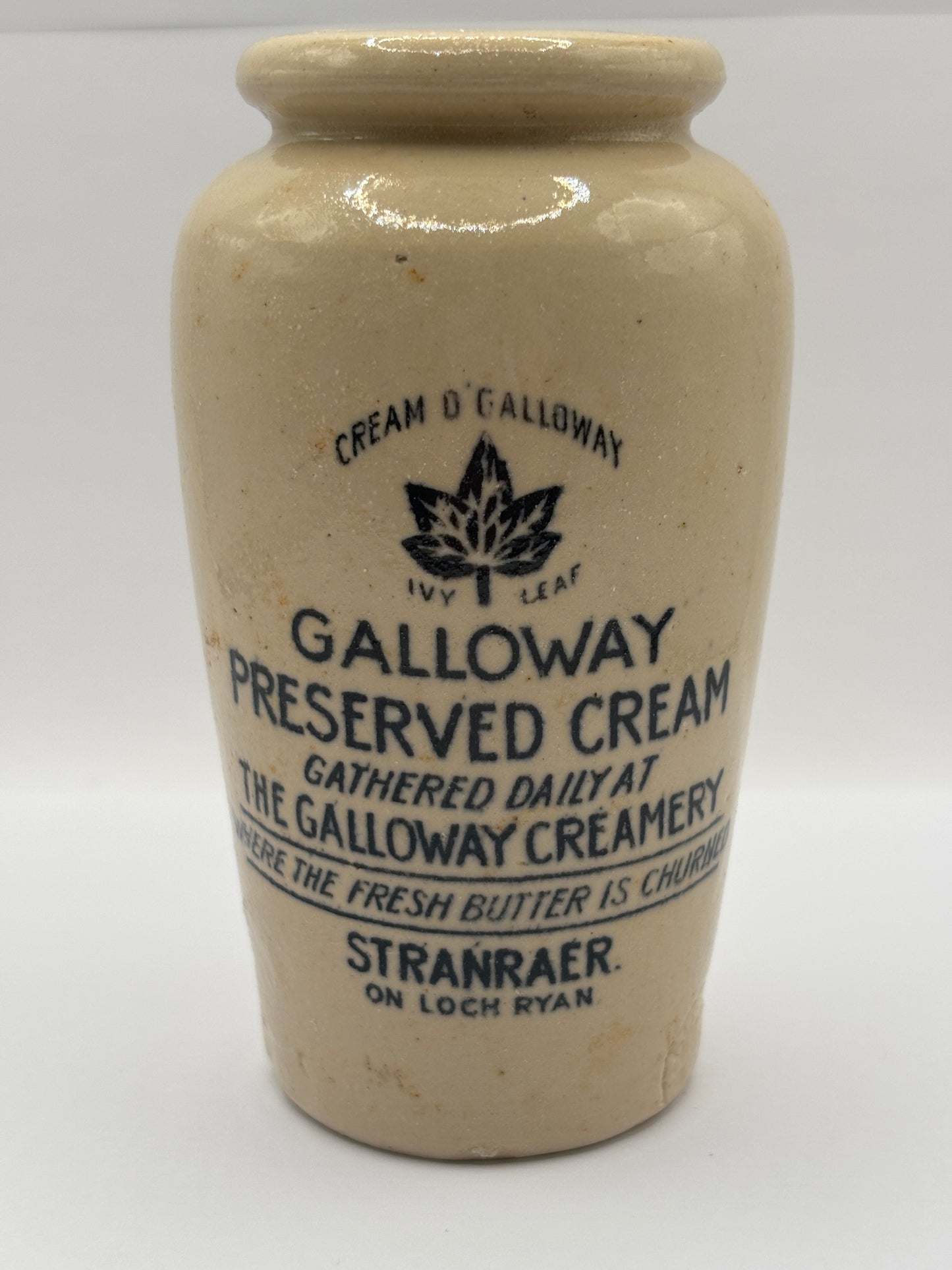 Old advertising cream pot, Galloway creamery Stranraer. Damaged