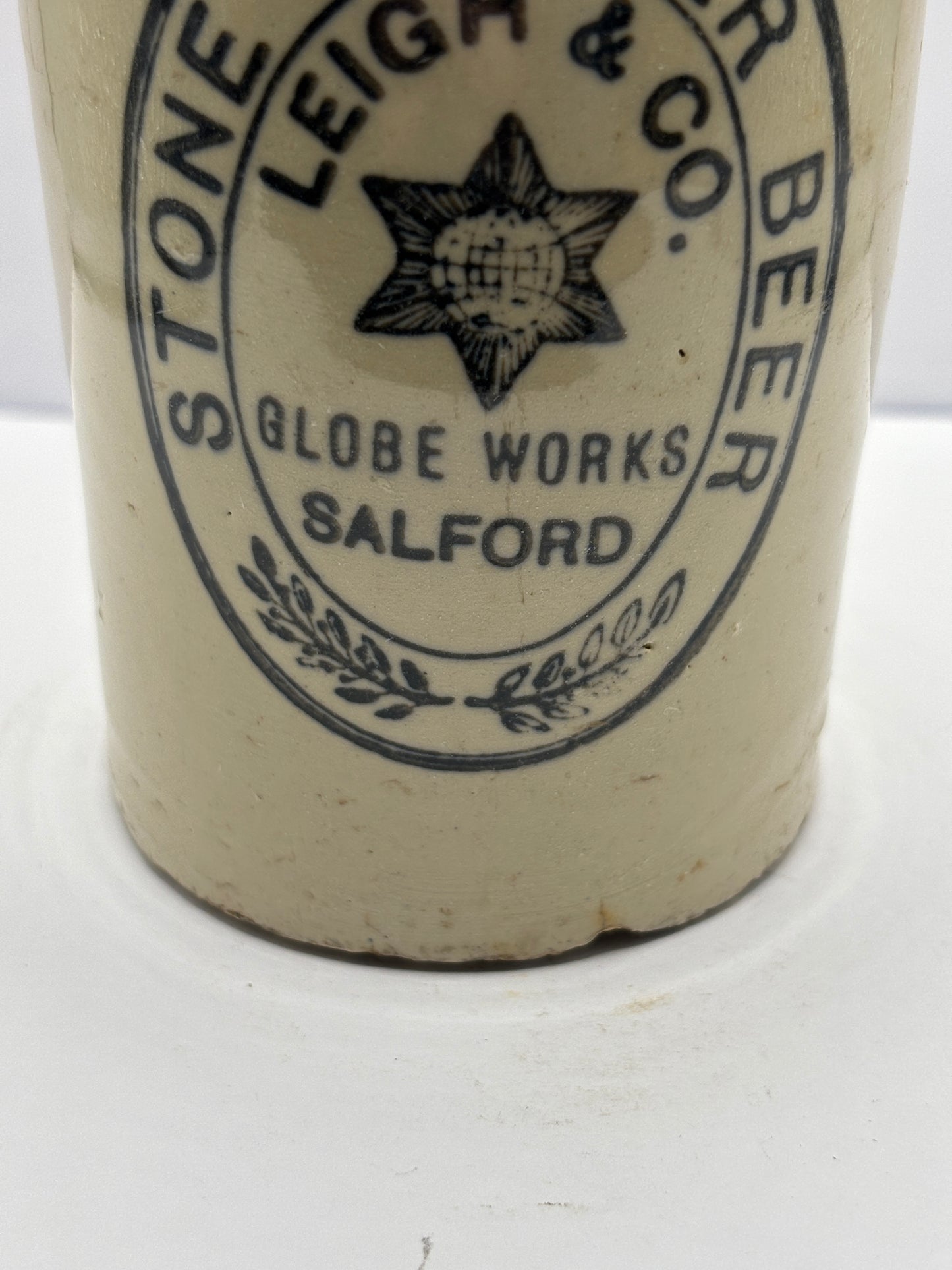 Old stoneware ginger beer bottle, Leigh & Co Salford