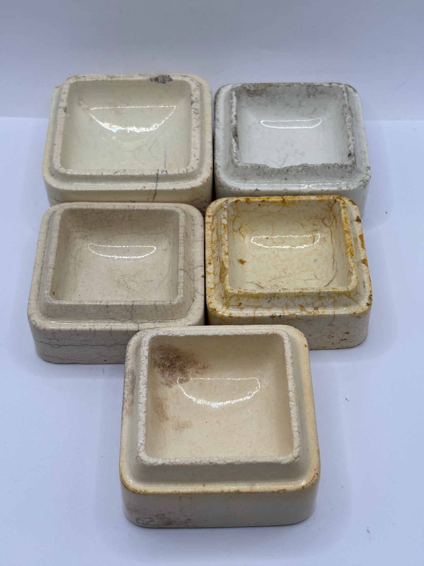5 old square bases, stackers (F) damages