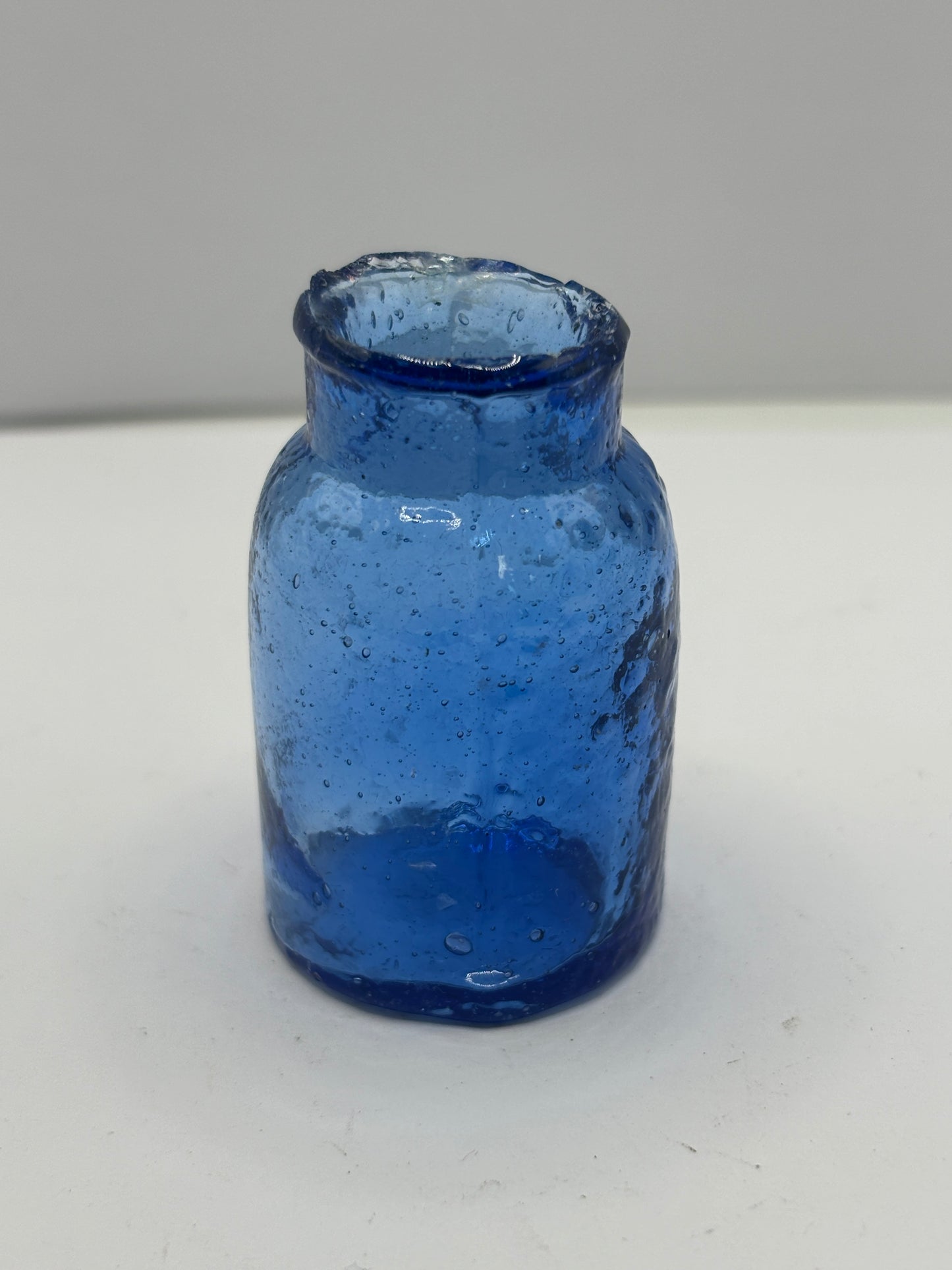 Small blue rat paste bottle