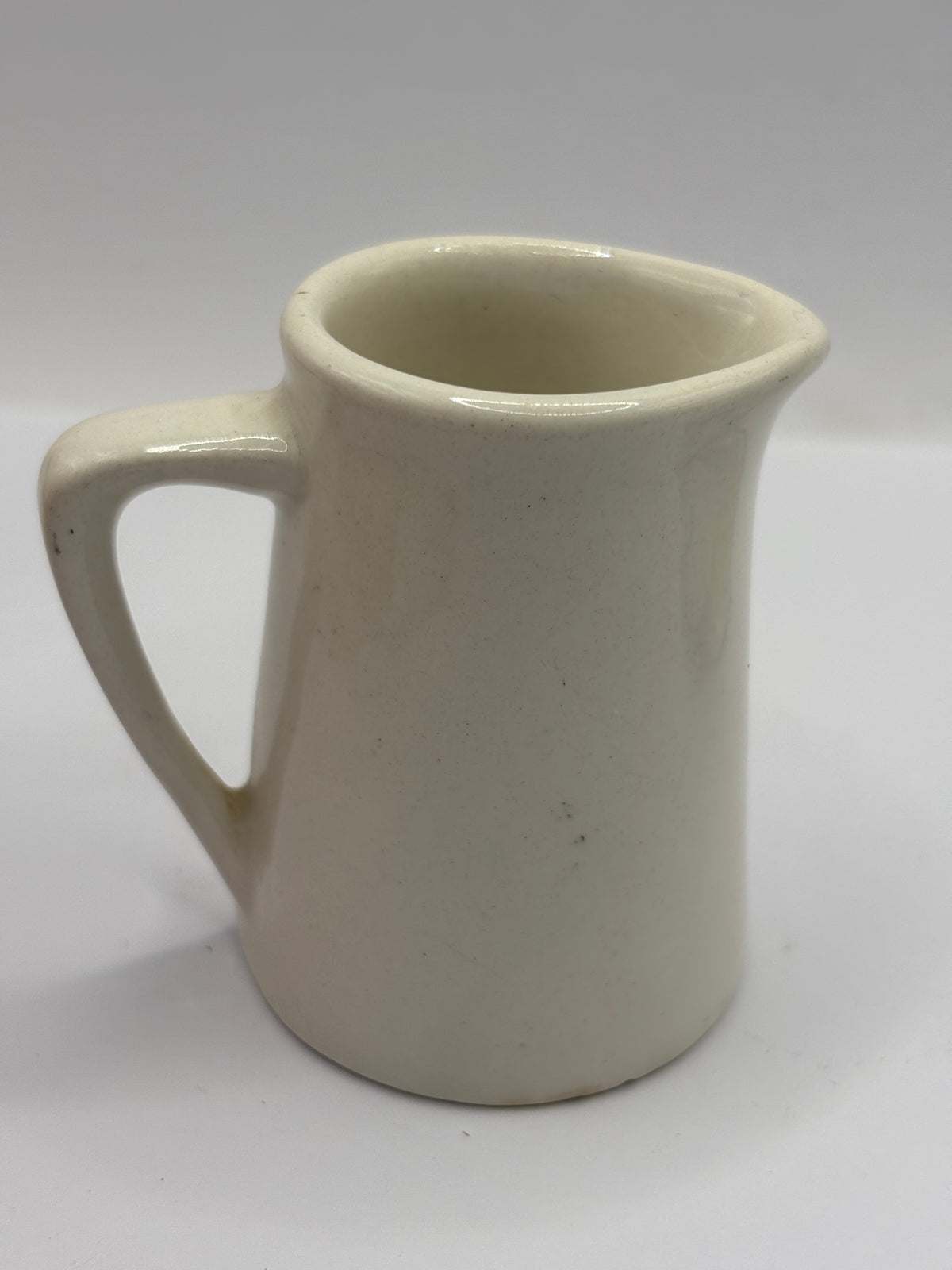 Old advertising creamer jug, Commercial hotel
