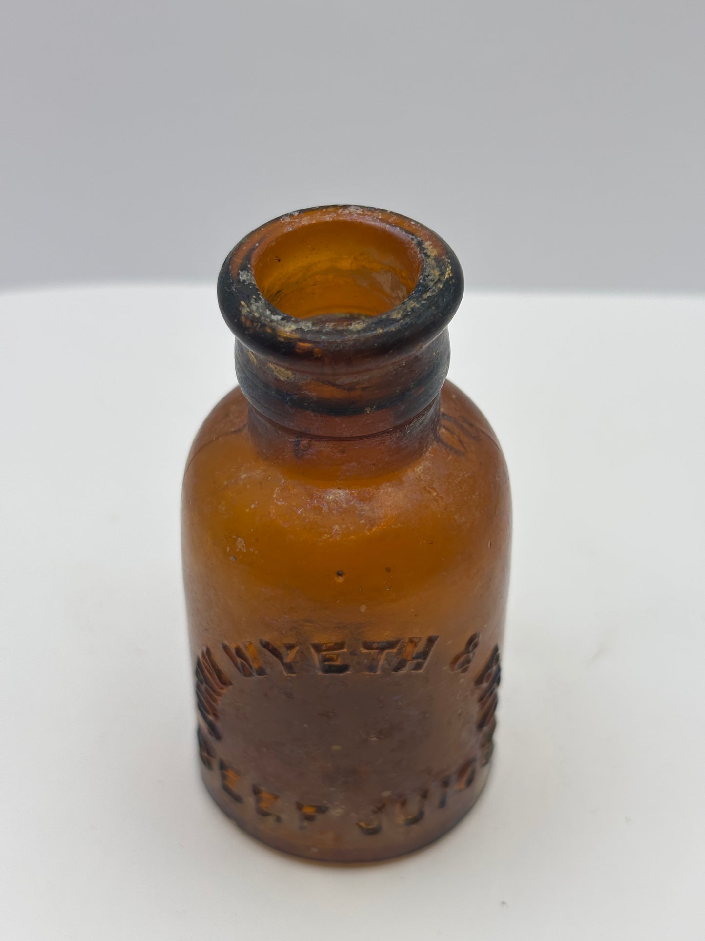 Old amber glass beef juice bottle