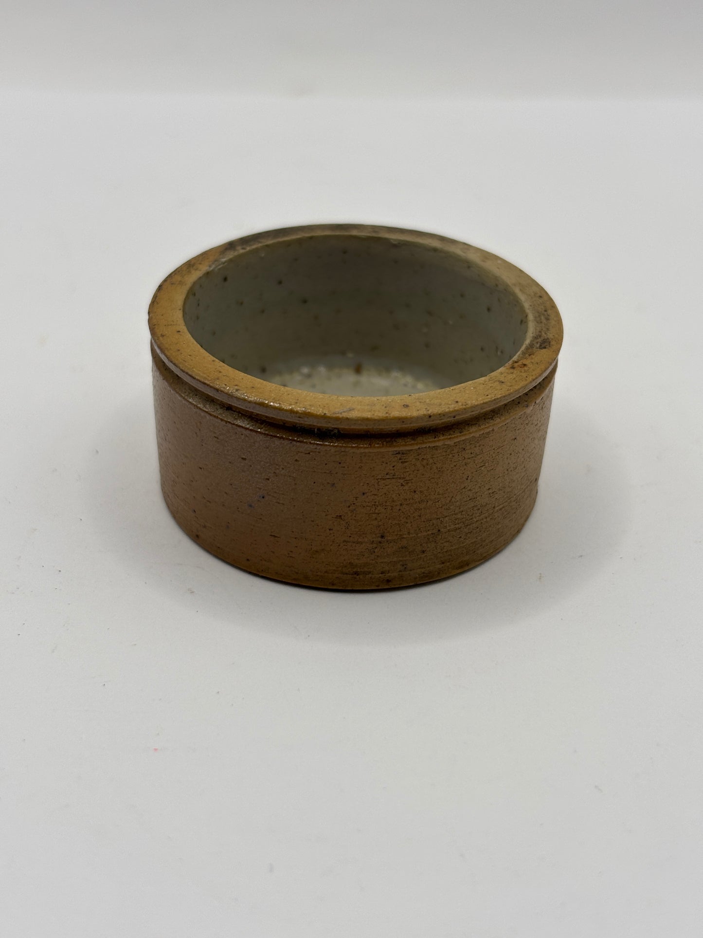 Small brown stoneware ointment dish