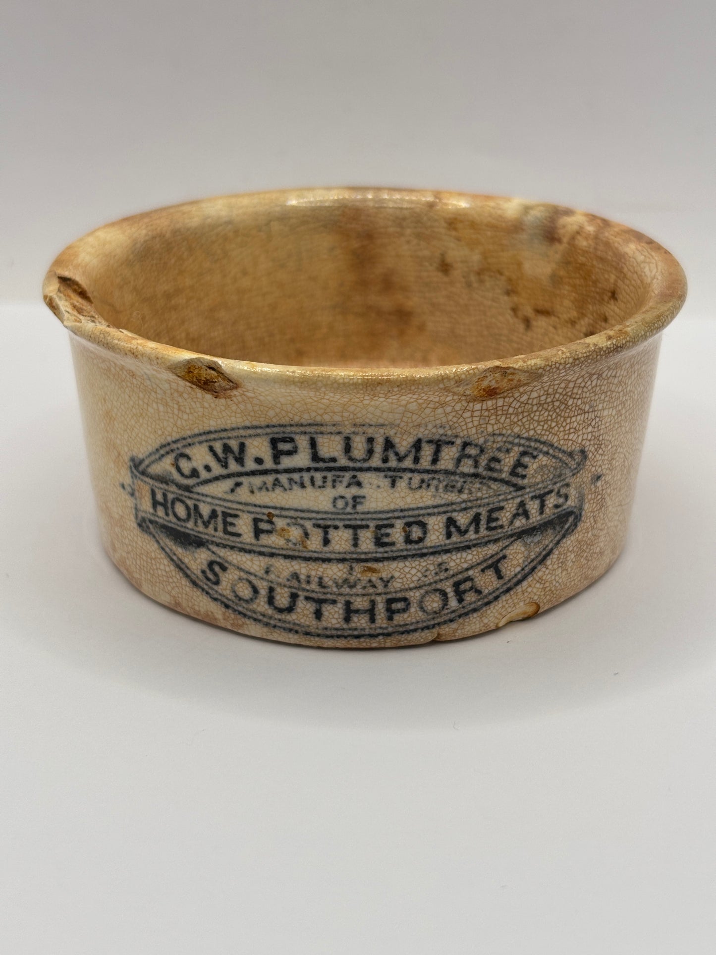Old Plumtree advertising meat paste pot. Damaged