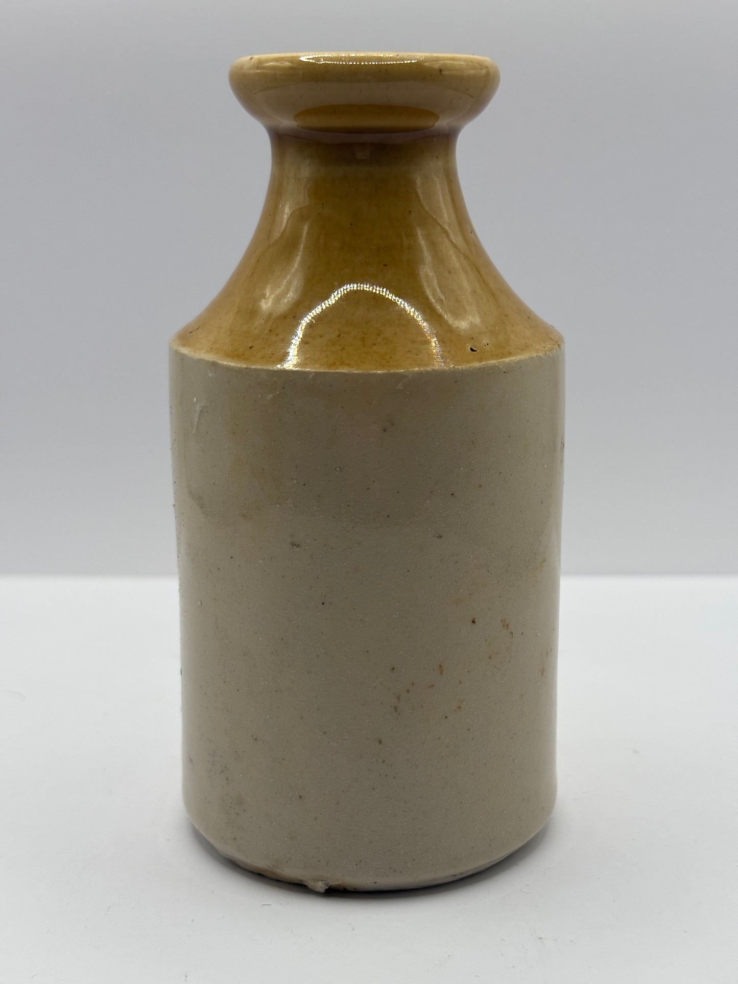 Old brown top stoneware pot, small vase