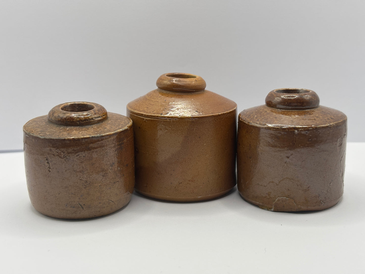 3 old stoneware pork pie inks, inkwells