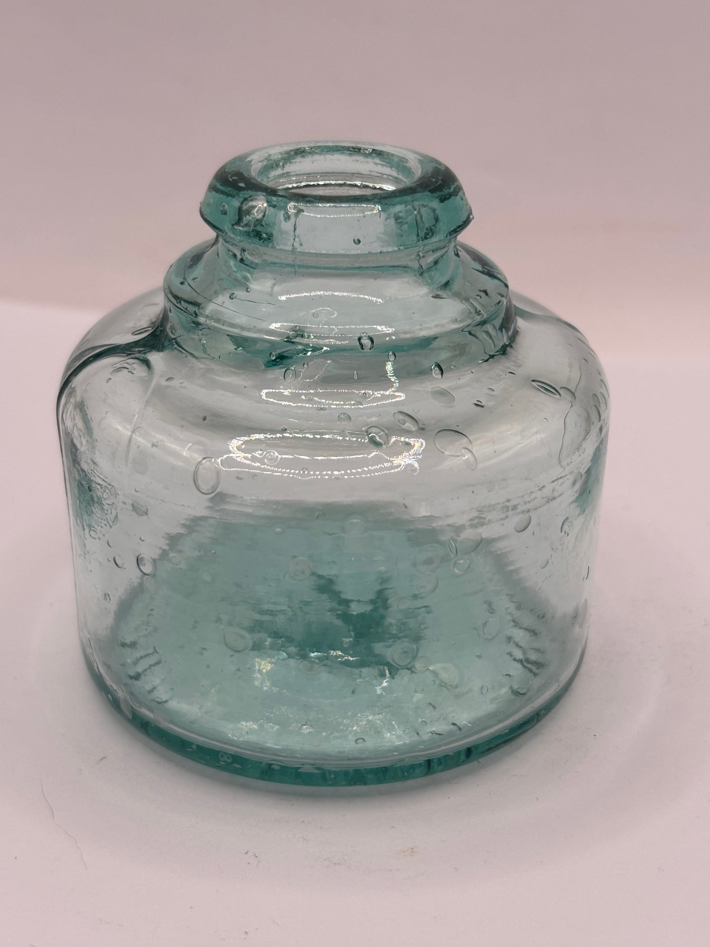 Old aqua glass inkwell, swan ink. Ink bottle