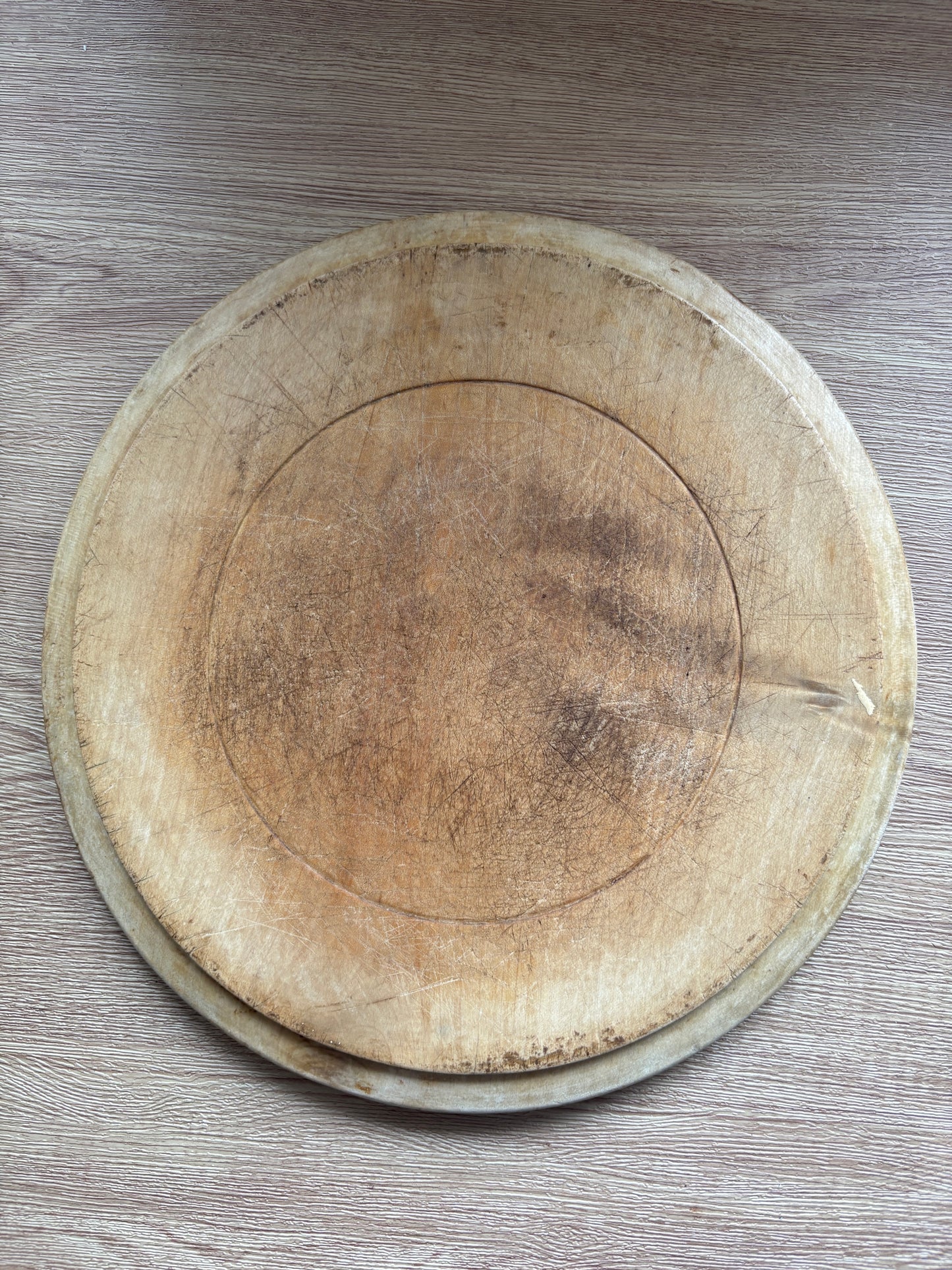 Old wooden carved bread board