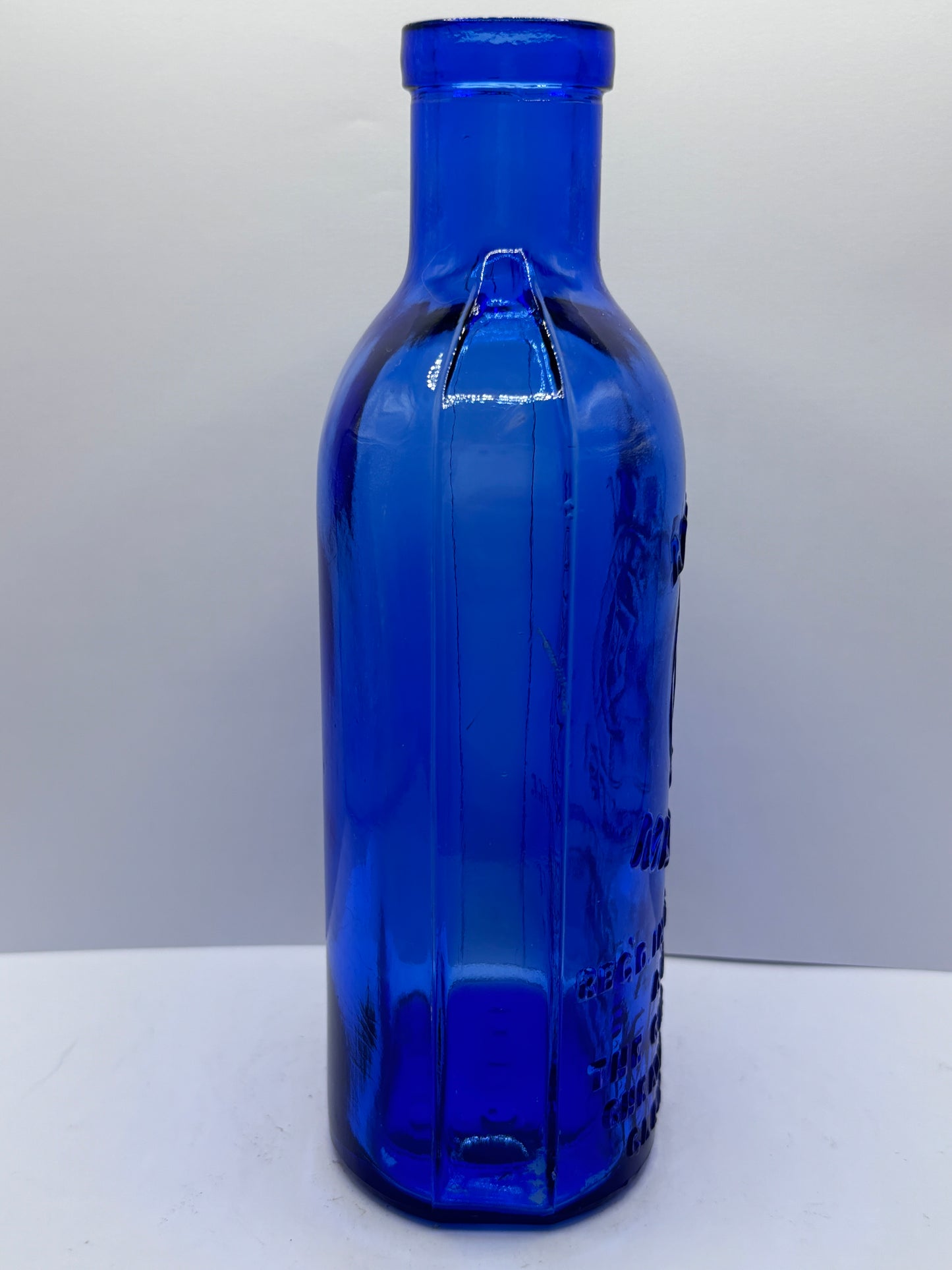 Old blue milk of magnesia bottle