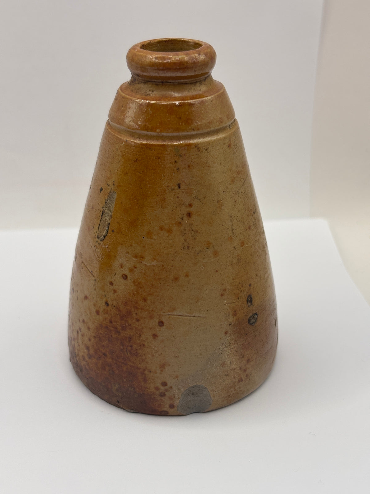 Old stoneware ink bottle, inkwell. Cone ink
