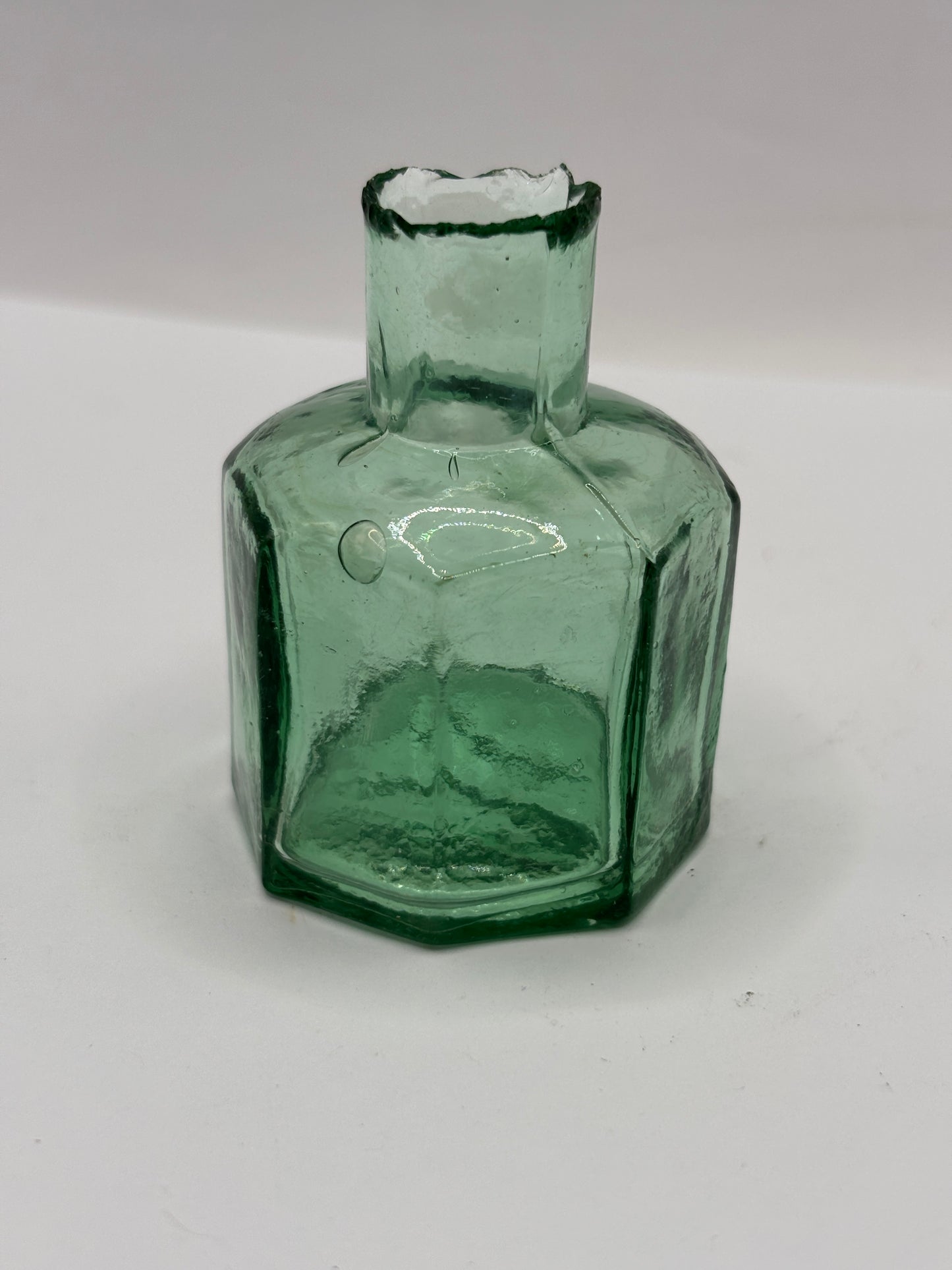 Old green glass ink bottle, inkwell, penny ink