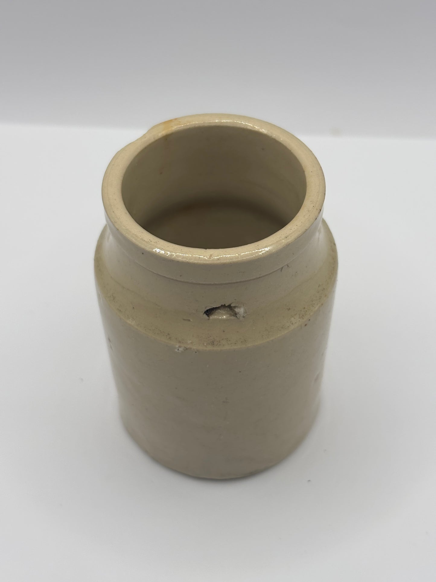 Old stoneware mustard pot. Chippy