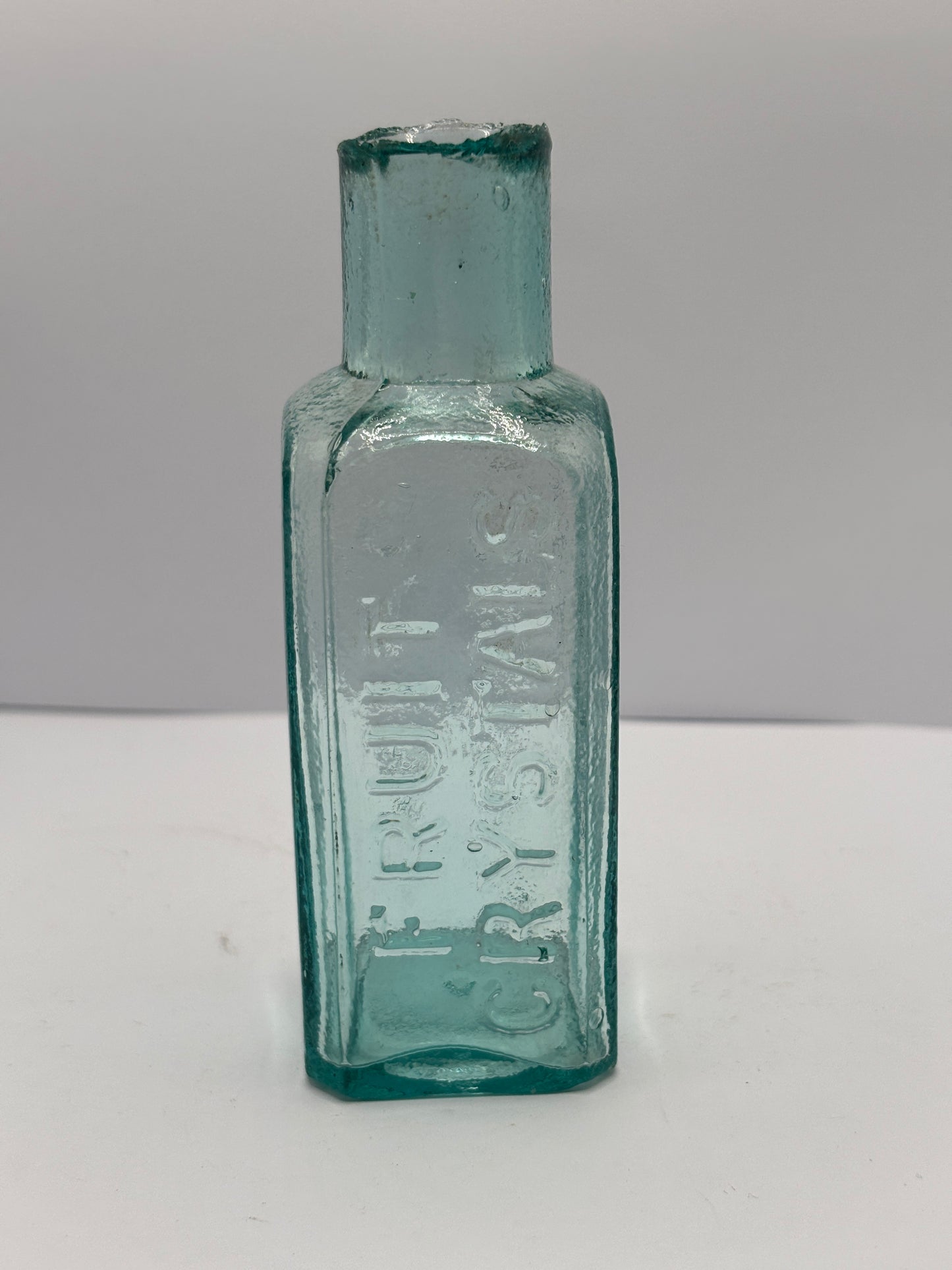 Old fruit crystals advertising bottle