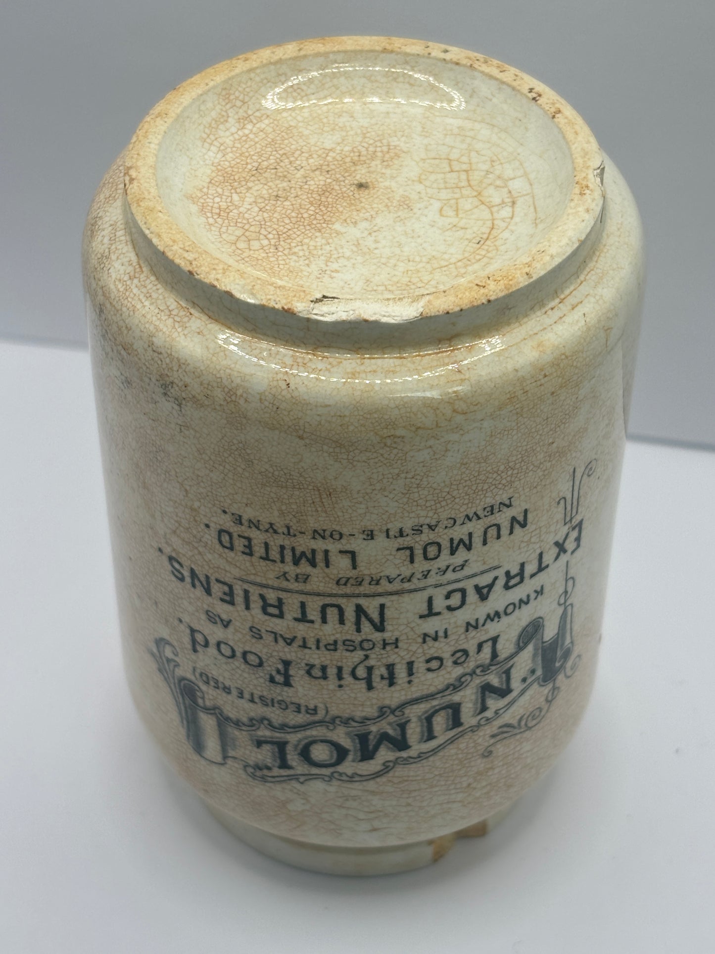 Early numol advertising jar